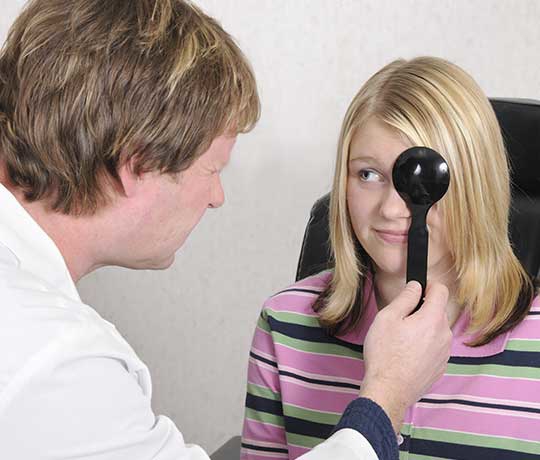 Pediatric patient with eye doctor