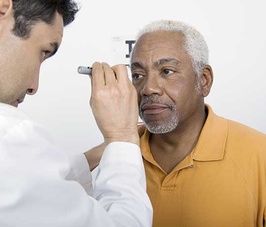 Patient being examined by ophtalmologist