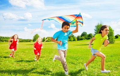 Pediatric dental patients flying kites after receiving care under sedation