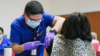 patient receiving covid-19 vaccine